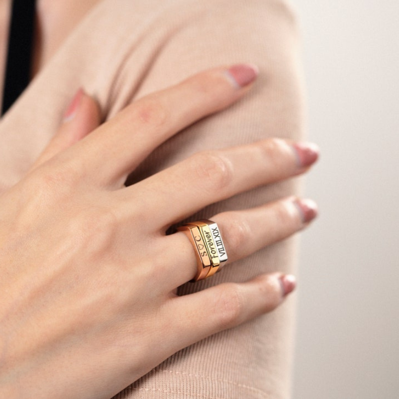 Custom Engraved Signet Ring – Personalised Just for You

Create a one-of-a-kind custom signet ring with an engraving that reflects your style. Whether for everyday wear or special occasions, this personalised signet ring makes a bold statement. Designed for comfort and durability, it’s the perfect blend of elegance and individuality.
